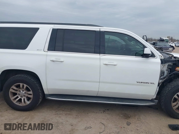 2015 GMC Yukon XL SLT with VIN 1GKS1HKCXFR652337, listed as a IAAI auction lot 41330287 with 139,268 mi miles. Bid and sale history available at carsss.com. Image 14.