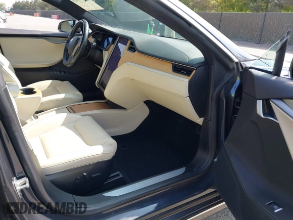 2020 Tesla Model S Long Range with VIN 5YJSA1E24LF415849, listed as a IAAI auction lot 42571945 with 34,398 mi miles and . Bid and sale history available at DreamBid. Image 5.