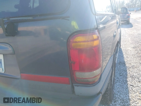 1998 Mercury Mountaineer z VIN 4M2ZU55P3WUJ17243, wystawiony jako IAAI lot #41658097 z przebiegiem 219 464 mil mil oraz . Historia ofert i sprzedaży dostępna na DreamBid. Obrazek 13.