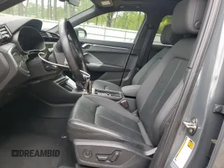 2019 Audi Q3 Premium z VIN WA1AECF32K1075590, wystawiony jako Copart lot #52745635 z przebiegiem 69 256 mil mil oraz Szkoda całkowita • Salvage title. Historia ofert i sprzedaży dostępna na DreamBid. Obrazek 7.