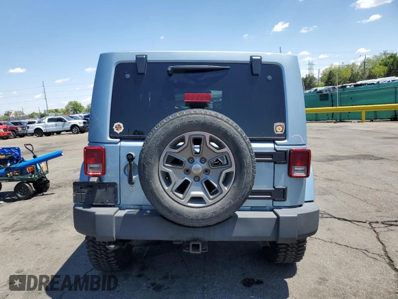 2012 Jeep Wrangler Arctic z VIN 1C4AJWBGXCL156600, wystawiony jako Copart lot #56369065 z przebiegiem 216 808 mil mil oraz Szkoda całkowita • Salvage title. Historia ofert i sprzedaży dostępna na DreamBid. Obrazek 6.