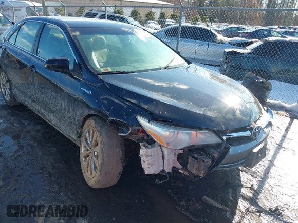2017 Toyota Camry Hybrid LE with VIN 4T1BD1FK9HU203089, listed as a IAAI auction lot 41315779 with 87,630 mi miles. Bid and sale history available at carsss.com. Image 6.