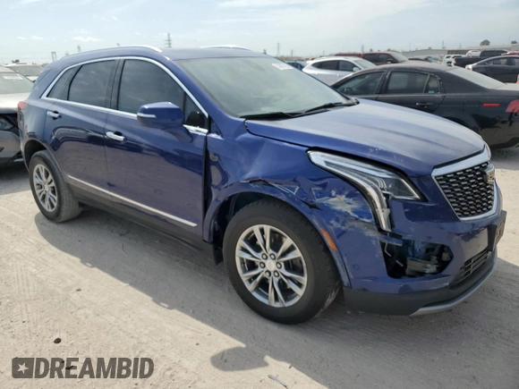 2023 Cadillac XT5 FWD Premium Luxury with VIN 1GYKNCRS3PZ154122, listed as a Copart auction lot 53667425 with 52,279 mi miles and Salvage Title. Bid and sale history available at carsss.com. Image 4.
