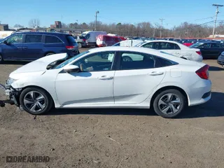 2020 Honda Civic Sedan LX with VIN 2HGFC2F60LH571286, listed as a IAAI auction lot 41730717 with 25,584 mi miles. Bid and sale history available at carsss.com. Image 14.