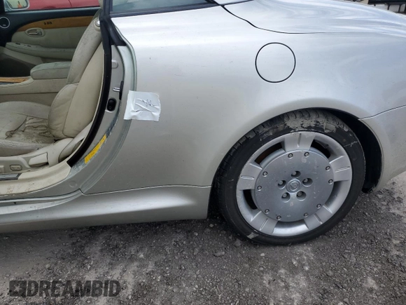 2002 Lexus SC 430 z VIN JTHFN48Y720005677, wystawiony jako Copart lot #74929694 z przebiegiem Nie podano mil oraz Szkody całkowita. Historia ofert i sprzedaży dostępna na DreamBid. Obrazek 12.