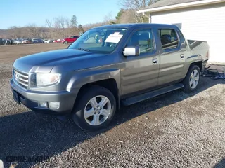 2013 Honda Ridgeline RTL with VIN 5FPYK1F55DB004842, listed as a IAAI auction lot 41843327 with 178,997 mi miles. Bid and sale history available at carsss.com. Image 2.