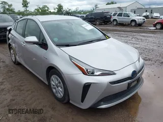2019 Toyota Prius L Eco z VIN JTDKARFU2K3096560, wystawiony jako IAAI lot #42322950 z przebiegiem 20 866 mil mil oraz . Historia ofert i sprzedaży dostępna na DreamBid. Obrazek 1.