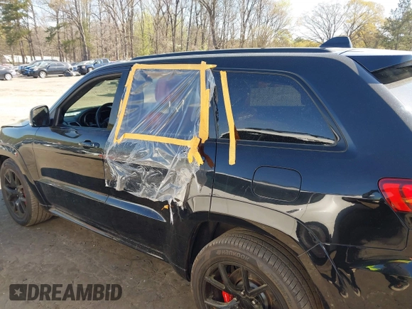 2017 Jeep Grand Cherokee SRT with VIN 1C4RJFDJ2HC696025, listed as a IAAI auction lot 41863274 with 126,949 mi miles. Bid and sale history available at carsss.com. Image 14.