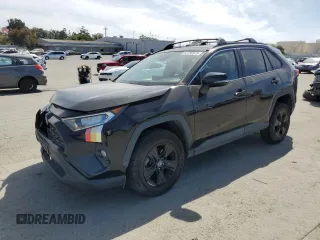 2019 Toyota RAV4 XLE with VIN 2T3P1RFV6KW034462, listed as a Copart auction lot 54188675 with 100,454 mi miles and Salvage title. Bid and sale history available at DreamBid. Image 1.