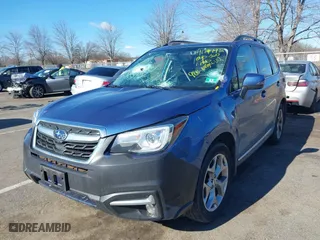 2018 Subaru Forester Touring with VIN JF2SJAWCXJH467976, listed as a IAAI auction lot 41744472 with 98,919 mi miles. Bid and sale history available at carsss.com. Image 17.