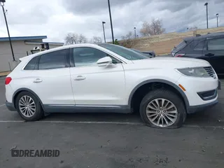 2016 Lincoln MKX Select with VIN 2LMTJ6KR5GBL30010, listed as a IAAI auction lot 41741385 with 112,647 mi miles. Bid and sale history available at carsss.com. Image 13.