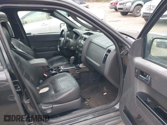2011 Ford Escape Limited with VIN 1FMCU9EG6BKB90000, listed as a IAAI auction lot 42002010 with 215,825 mi miles. Bid and sale history available at carsss.com. Image 5.