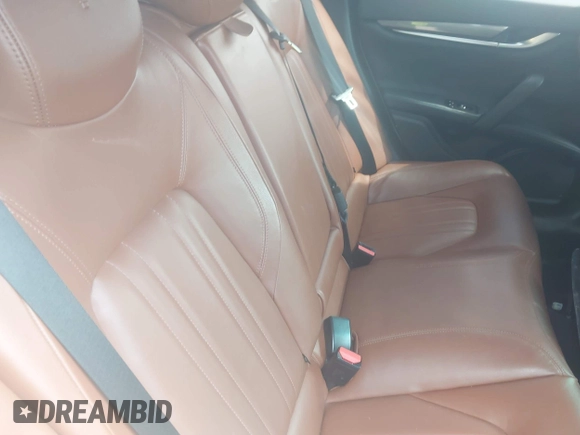 2015 Maserati Ghibli with VIN ZAM57XSA4F1148845, listed as a IAAI auction lot 42605057 with 69,446 mi miles and . Bid and sale history available at DreamBid. Image 8.