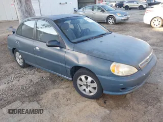 2002 Kia Rio with VIN KNADC123826128733, listed as a IAAI auction lot 41643123 with 101,433 mi miles. Bid and sale history available at carsss.com. Image 1.