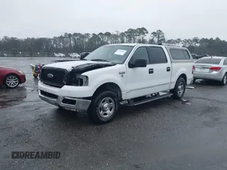 2004 Ford F-150 XLT with VIN 1FTRW12W14KC48930, listed as a IAAI auction lot 41759833 with 0 mi miles. Bid and sale history available at carsss.com. Image 2.