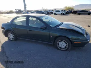 1996 Saturn SL with VIN 1G8ZK5272TZ137198, listed as a Copart auction lot 72446614 with 99,586 mi miles and Salvage title. Bid and sale history available at DreamBid. Image 4.