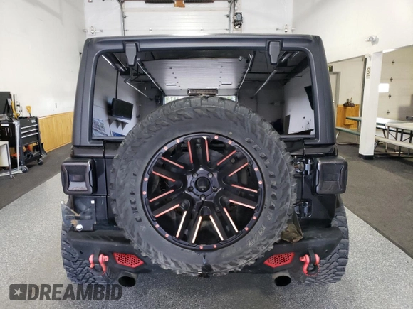 2020 Jeep Wrangler Unlimited Sahara z VIN 1C4HJXEN8LW118599, wystawiony jako Copart lot #60687535 z przebiegiem 74 824 mil mil oraz Czysty tytuł • Clean title. Historia ofert i sprzedaży dostępna na DreamBid. Obrazek 6.