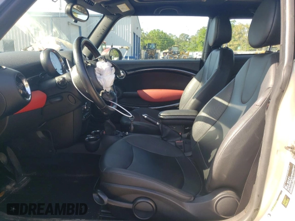 2012 MINI Hardtop with VIN WMWSU3C53CT369974, listed as a Copart auction lot 53238895 with 130,734 mi miles and Salvage Title. Bid and sale history available at DreamBid. Image 7.