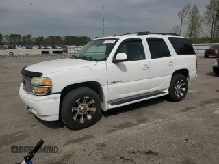 2004 GMC Yukon Denali z VIN 1GKEK63U74J327436, wystawiony jako Copart lot #49072275 z przebiegiem 249 763 mil mil oraz Szkoda całkowita • Salvage title. Historia ofert i sprzedaży dostępna na DreamBid. Obrazek 1.