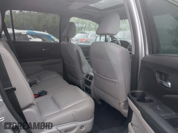 2019 Honda Pilot Touring 8-Passenger with VIN 5FNYF6H98KB097105, listed as a IAAI auction lot 42353009 with 133,212 mi miles and . Bid and sale history available at DreamBid. Image 8.