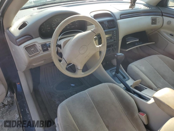 1999 Toyota Solara SE with VIN 2T1CG22P2XC231495, listed as a Copart auction lot 85018294 with 229,607 mi miles and Salvage Title. Bid and sale history available at DreamBid. Image 8.