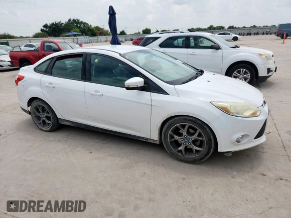 2013 Ford Focus SE with VIN 1FADP3F20DL289978, listed as a Copart auction lot 63350585 with 211,677 mi miles and Salvage title. Bid and sale history available at DreamBid. Image 4.