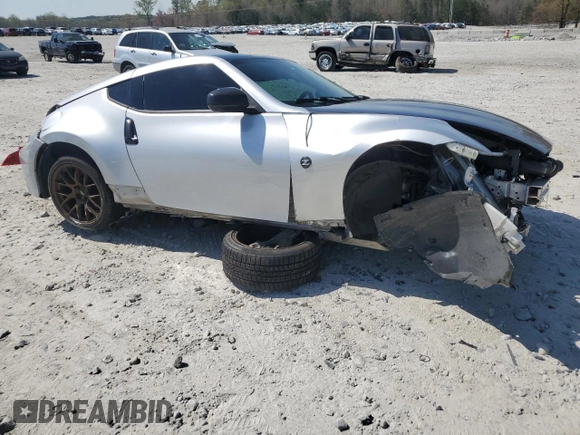 2009 Nissan 370Z Touring with VIN JN1AZ44E49M411367, listed as a Copart auction lot 50430355 with 74,909 mi miles and Salvage Title. Bid and sale history available at carsss.com. Image 4.
