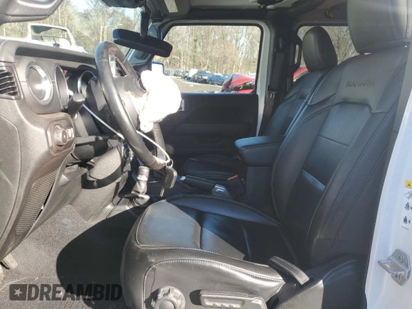 2020 Jeep Wrangler Unlimited Sahara with VIN 1C4HJXEG5LW150427, listed as a Copart auction lot 82891084 with 85,018 mi miles and Salvage Title. Bid and sale history available at carsss.com. Image 7.