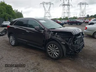 2017 Cadillac XT5 Platinum AWD z VIN 1GYKNFRS2HZ224860, wystawiony jako IAAI lot #42272142 z przebiegiem 95 697 mil mil oraz . Historia ofert i sprzedaży dostępna na DreamBid. Obrazek 17.