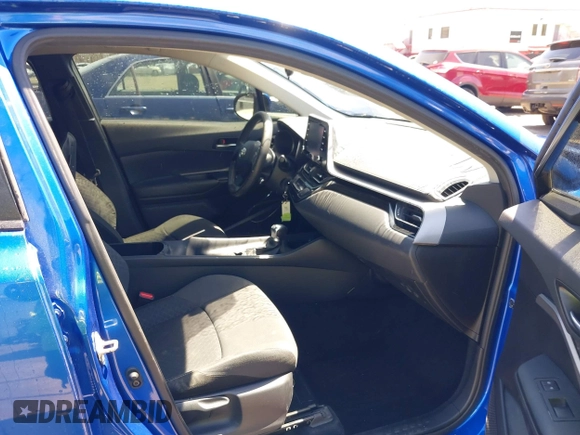2020 Toyota C-HR LE with VIN JTNKHMBX7L1071287, listed as a IAAI auction lot 42063896 with 76,731 mi miles. Bid and sale history available at carsss.com. Image 5.