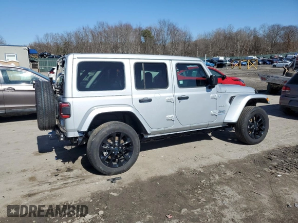 2024 Jeep Wrangler Sahara with VIN 1C4RJXP63RW195206, listed as a Copart auction lot 48784595 with 10,737 mi miles and Salvage Title. Bid and sale history available at DreamBid. Image 3.