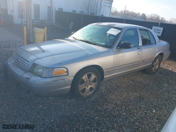 2005 Ford Crown Victoria LX with VIN 2FAFP74W95X166416, listed as a IAAI auction lot 41526872 with 195,589 mi miles. Bid and sale history available at carsss.com. Image 2.