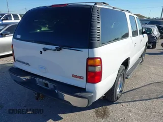 2001 GMC Yukon XL SLT with VIN 3GKEC16TX1G265630, listed as a IAAI auction lot 40869322 with 284,692 mi miles. Bid and sale history available at carsss.com. Image 4.