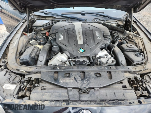 2013 BMW 5 Series 550i xDrive with VIN WBAFU9C55DDY72065, listed as a Copart auction lot 63023675 with 117,592 mi miles and Salvage title. Bid and sale history available at DreamBid. Image 11.