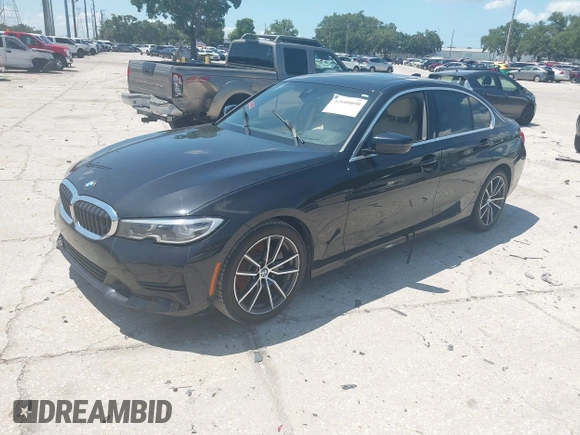 2019 BMW 3 Series 330i z VIN WBA5R1C5XKAK12214, wystawiony jako IAAI lot #42600090 z przebiegiem Nie podano mil oraz . Historia ofert i sprzedaży dostępna na DreamBid. Obrazek 2.