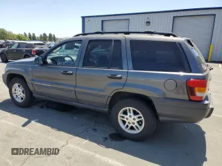 2004 Jeep Grand Cherokee Laredo with VIN 1J4GW48S54C430857, listed as a Copart auction lot 62744305 with 122,099 mi miles and Salvage title. Bid and sale history available at DreamBid. Image 2.