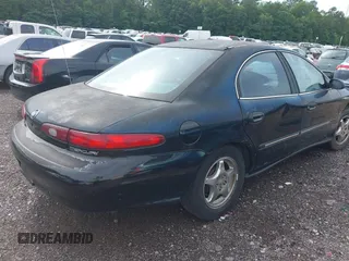 1999 Mercury Sable LS Premium Group z VIN 1MEFM53S7XA632876, wystawiony jako IAAI lot #42303137 z przebiegiem 178 617 mil mil oraz . Historia ofert i sprzedaży dostępna na DreamBid. Obrazek 4.