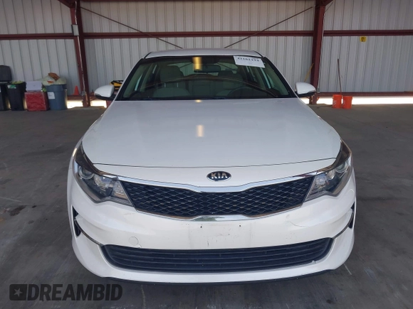 2016 Kia Optima LX with VIN KNAGT4L34G5105864, listed as a IAAI auction lot 42161194 with 106,351 mi miles. Bid and sale history available at carsss.com. Image 12.