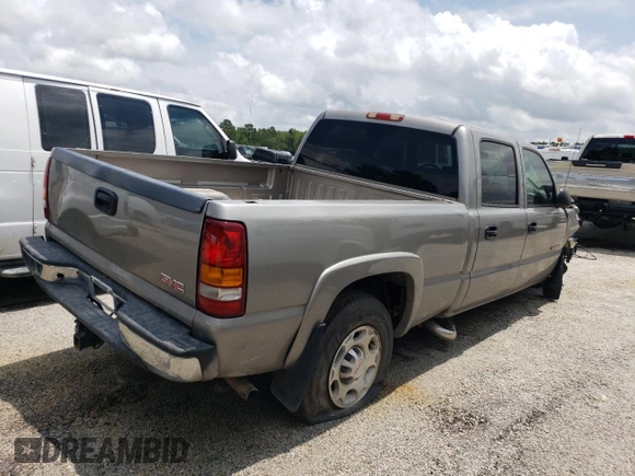 2003 GMC Sierra 1500HD SLE z VIN 1GTGC13U73F105405, wystawiony jako Copart lot #76817714 z przebiegiem 213 665 mil mil oraz Szkody całkowita. Historia ofert i sprzedaży dostępna na DreamBid. Obrazek 3.