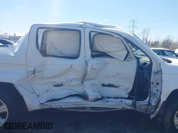 2009 Honda Ridgeline RTL with VIN 5FPYK16529B107871, listed as a IAAI auction lot 42049833 with 141,214 mi miles. Bid and sale history available at carsss.com. Image 14.
