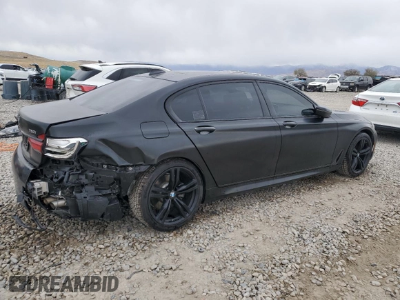 2018 BMW 7 Series 750i with VIN WBA7F0C55JGM23537, listed as a Copart auction lot 76824074 with 64,682 mi miles and Salvage Title. Bid and sale history available at carsss.com. Image 3.
