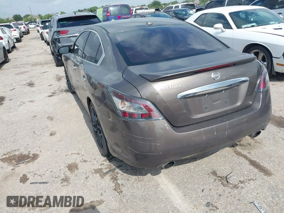 2014 Nissan Maxima SV with VIN 1N4AA5AP2EC447824, listed as a IAAI auction lot 42481206 with 157,540 mi miles and . Bid and sale history available at DreamBid. Image 3.
