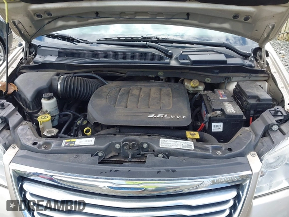 2014 Chrysler Town & Country Touring with VIN 2C4RC1BG2ER413257, listed as a IAAI auction lot 42181370 with 163,374 mi miles and . Bid and sale history available at DreamBid. Image 10.
