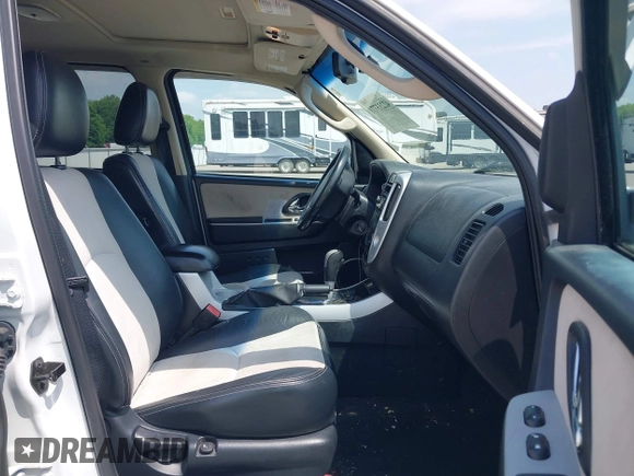 2007 Mercury Mariner Premier z VIN 4M2CU87107KJ12711, wystawiony jako IAAI lot #42233771 z przebiegiem 182 355 mil mil oraz . Historia ofert i sprzedaży dostępna na DreamBid. Obrazek 5.