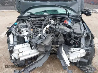 2025 Honda Civic Sport z VIN 19XFL2H84SE003646, wystawiony jako IAAI lot #42158531 z przebiegiem Nie podano mil oraz . Historia ofert i sprzedaży dostępna na DreamBid. Obrazek 10.