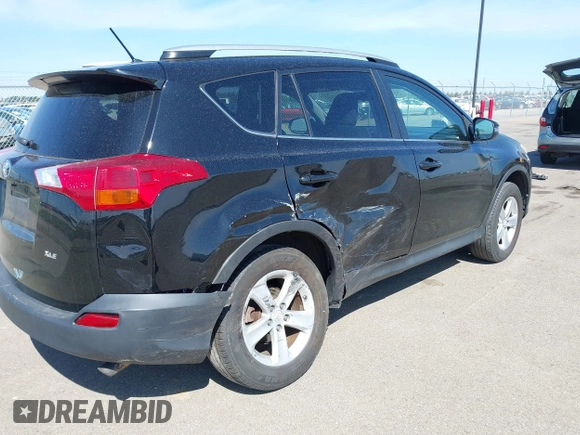 2013 Toyota RAV4 XLE with VIN 2T3WFREV0DW019201, listed as a IAAI auction lot 42145998 with 185,124 mi miles and . Bid and sale history available at DreamBid. Image 4.