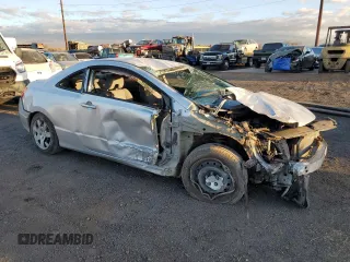 2010 Honda Civic Cpe LX with VIN 2HGFG1B63AH514226, listed as a Copart auction lot 84969424 with 115,520 mi miles and Salvage Title. Bid and sale history available at carsss.com. Image 4.