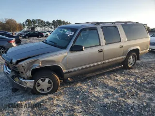1999 GMC Suburban with VIN 3GKEC16R2XG501779, listed as a Copart auction lot 85028254 with 170,417 mi miles and Salvage Title. Bid and sale history available at DreamBid. Image 1.