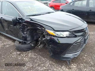 2019 Toyota Camry Hybrid LE z VIN 4T1B31HK5KU510055, wystawiony jako IAAI lot #42325522 z przebiegiem 97 000 mil mil oraz . Historia ofert i sprzedaży dostępna na DreamBid. Obrazek 6.