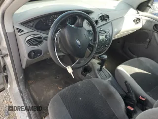 2003 Ford Focus LX с VIN 1FAFP33P63W187283, выставлен на аукционе Copart как лот 48803575 с пробегом Не указан миль и Списание • Salvage title. История ставок и продаж доступна на DreamBid. Изображение 8.